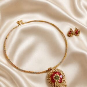 Dual tone haldi with Ad peacock pendant set