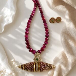 Tiger eyes with dhokla pendant