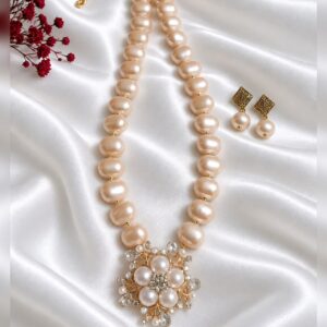 Shell pearls with brooch pendant